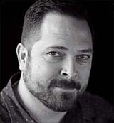 dan-headshot-blackbg.jpg